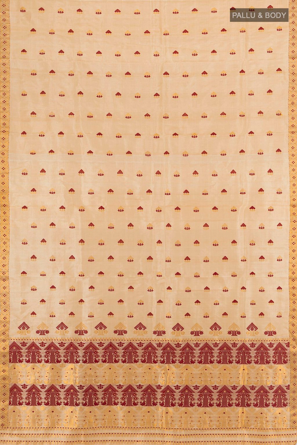 Flat view of Sandal Assam Silk Saree with Thread Butta on the body and Thread Border. 