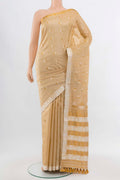 Beige Assam Silk Saree with Zari Butta on the body and Silk Border displayed on a mannequin