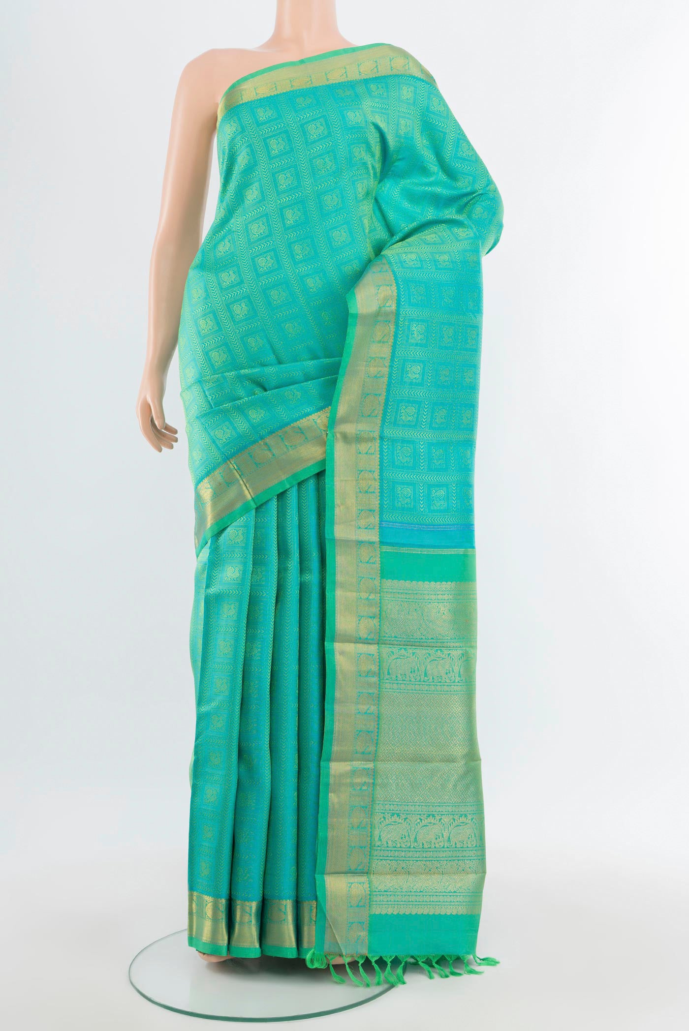 Pure Silk Pure Zari Sky Blue Kanjivaram Saree with Jacquard design on the body and Zari Border.  displayed on a mannequin