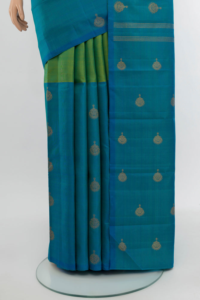 Pleats and pallu of Pure Silk Pure Zari Multi Color Kanchipuram Saree with Zari Butta on the body and Silk Border. 
