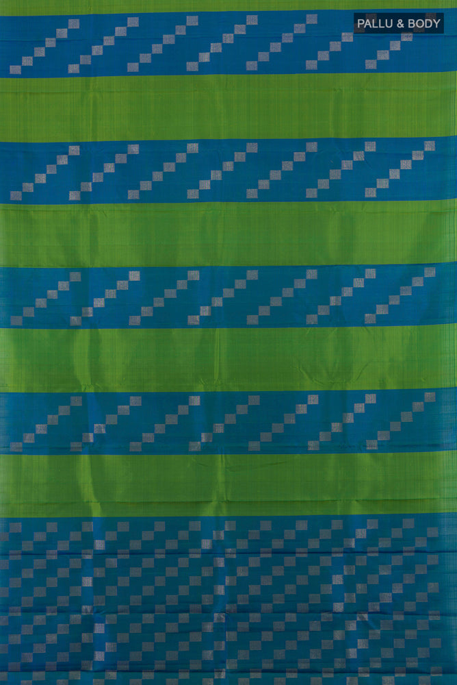 Flat view of Pure Silk Pure Zari Multi Color Kanchipuram Saree with Zari Butta on the body and Silk Border. 