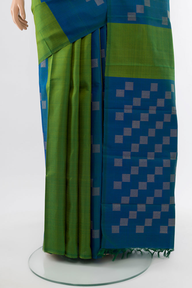 Pleats and pallu of Pure Silk Pure Zari Multi Color Kanchipuram Saree with Zari Butta on the body and Silk Border. 