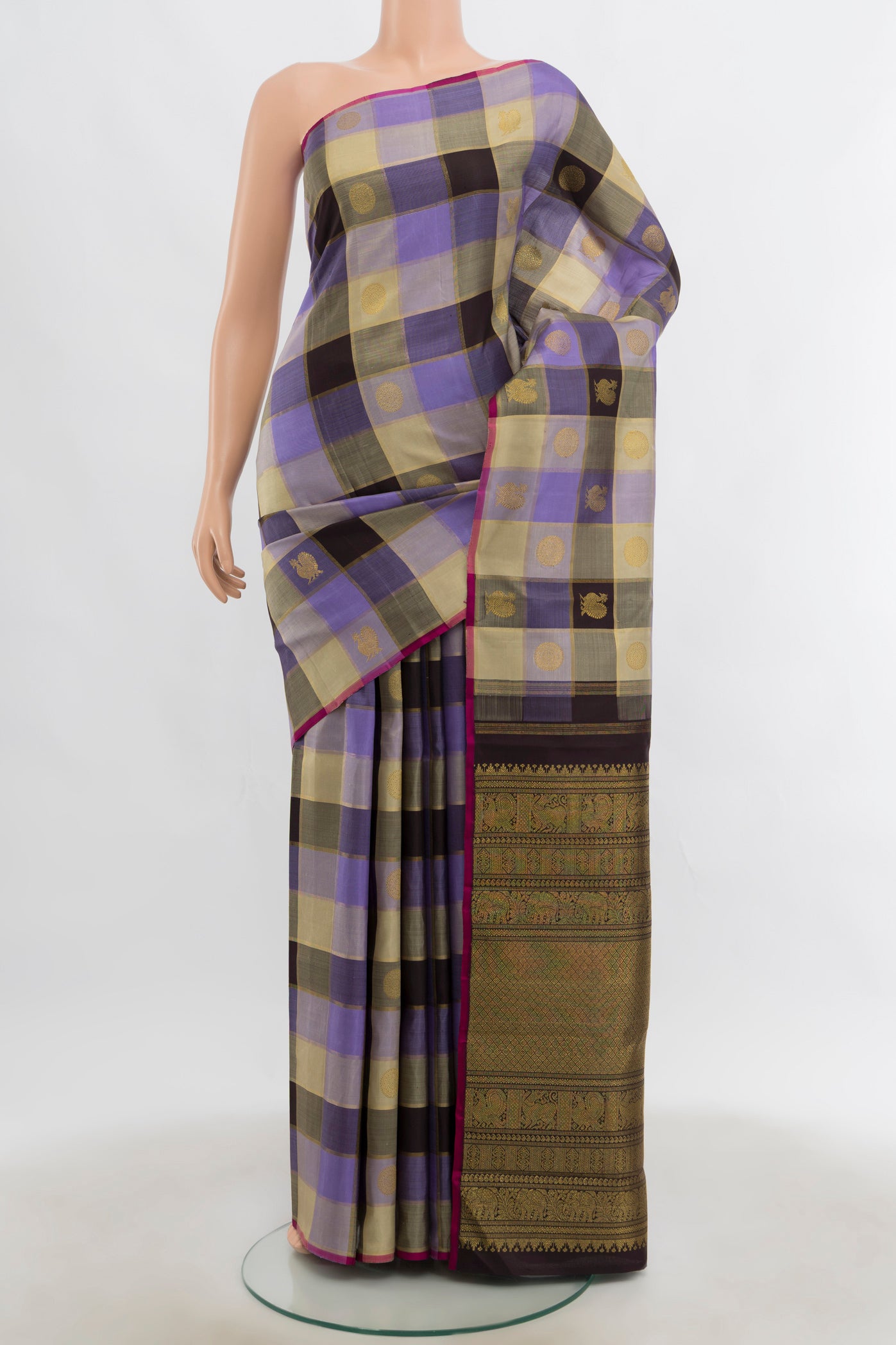 Multi Color Kanjivaram Silk Saree with Checked design on the body and Silk Border.  displayed on a mannequin