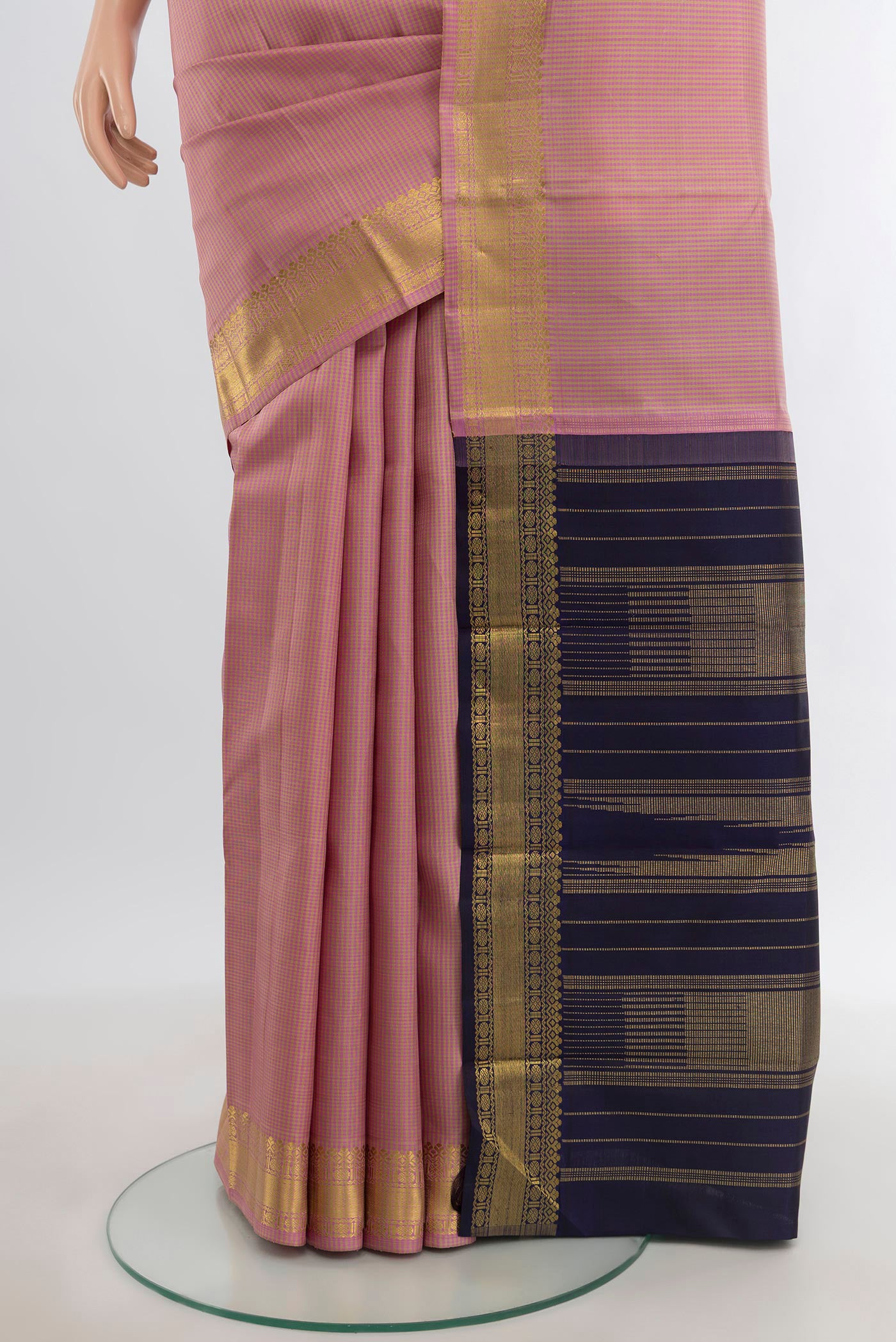 Pleats and pallu of Pure Silk Pure Zari Rose Gold Kanchipuram Saree with Checked design on the body and Zari Border. 