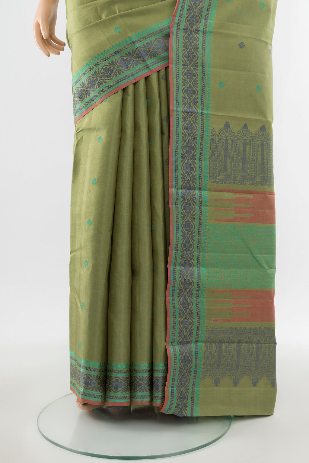 Pleats and pallu of Pure Silk Pure Zari Light Green Kanchipuram Saree with Zari Butta on the body and Silk Border. 