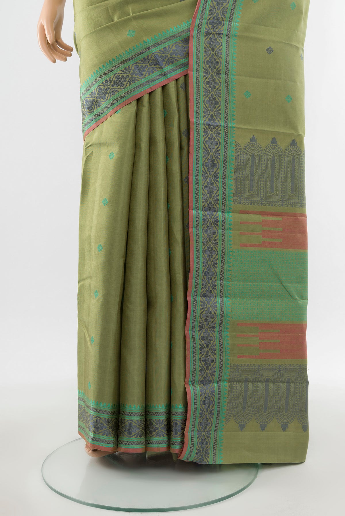 Pleats and pallu of Pure Silk Pure Zari Light Green Kanchipuram Saree with Zari Butta on the body and Silk Border. 