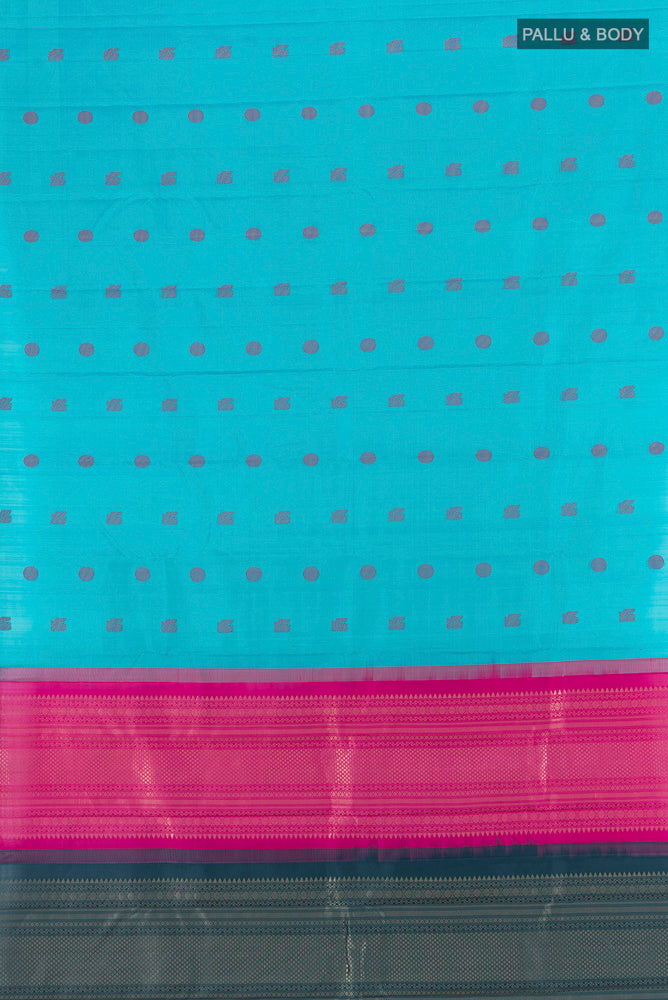 Flat view of Pure Silk Pure Zari Sky Blue Kanchipuram Saree with Zari Butta on the body and Silk Border. 