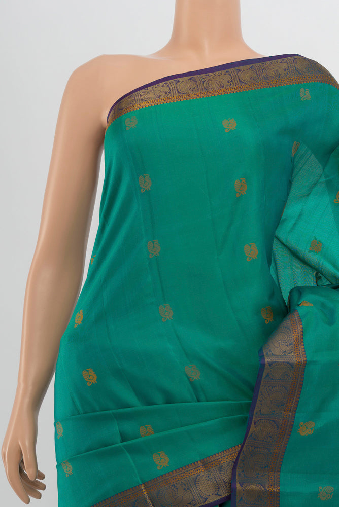 Border image of Peacock Blue Kanchipuram Silk Saree with Zari Butta on the body and Silk Border. 