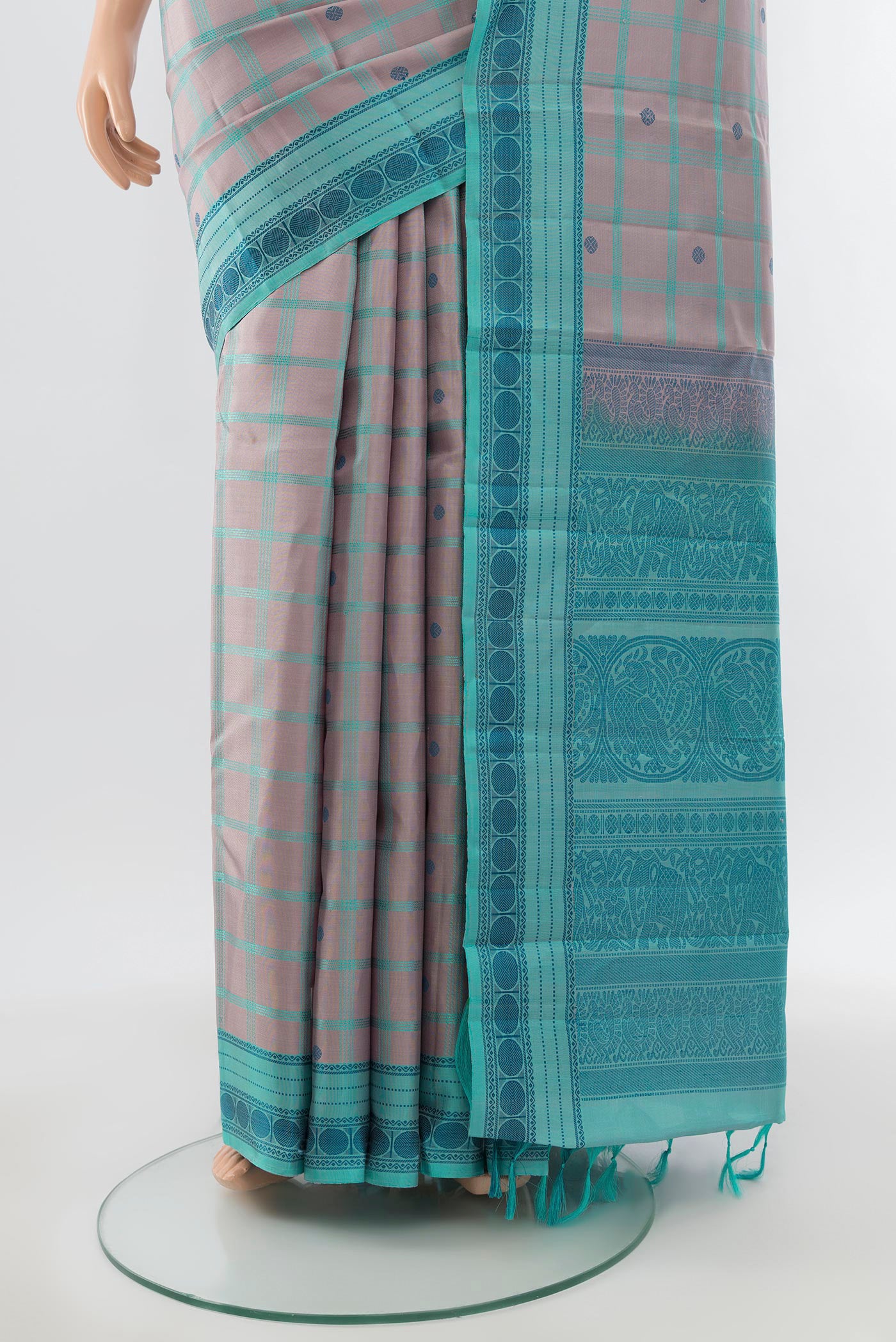 Pleats and pallu of Pure Silk Pure Zari Multi Color Kanchipuram Saree with Zari Butta on the body and Silk Border. 