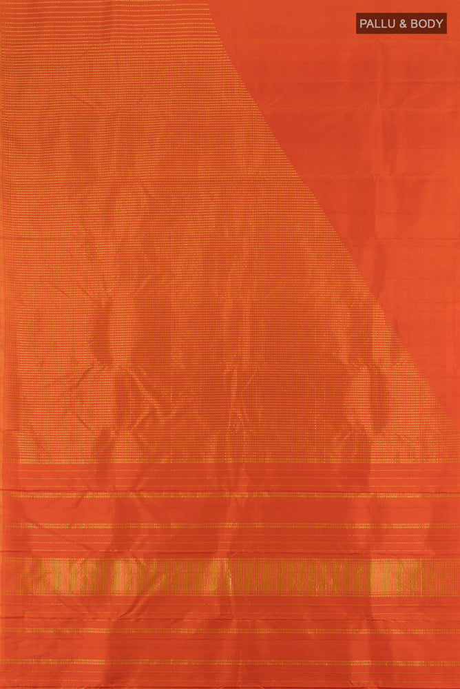 Flat view of Pure Silk Pure Zari Rust Kanchipuram Saree with Zari Butta on the body and Silk Border. 