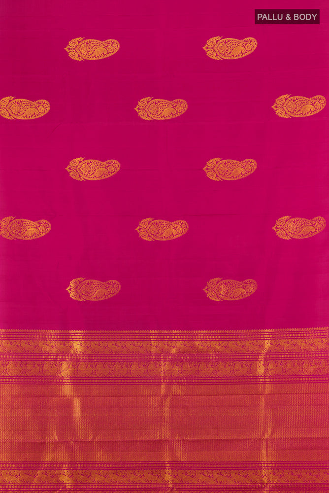 Flat view of Dark Pink Kanchipuram Silk Saree with Zari Butta on the body and Silk Border. 