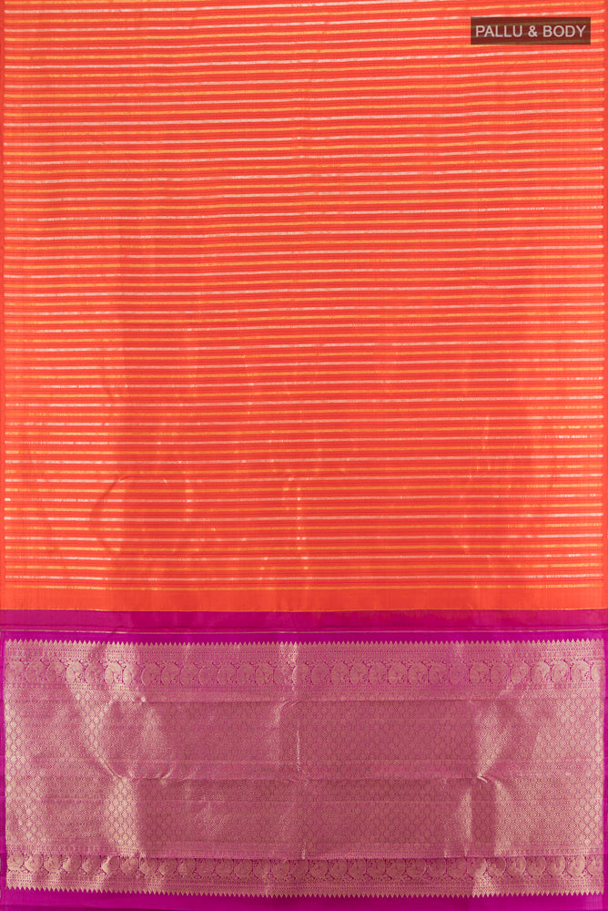 Flat view of Rust Kanchipuram Silk Saree with Zari Butta on the body and Fancy Border. 