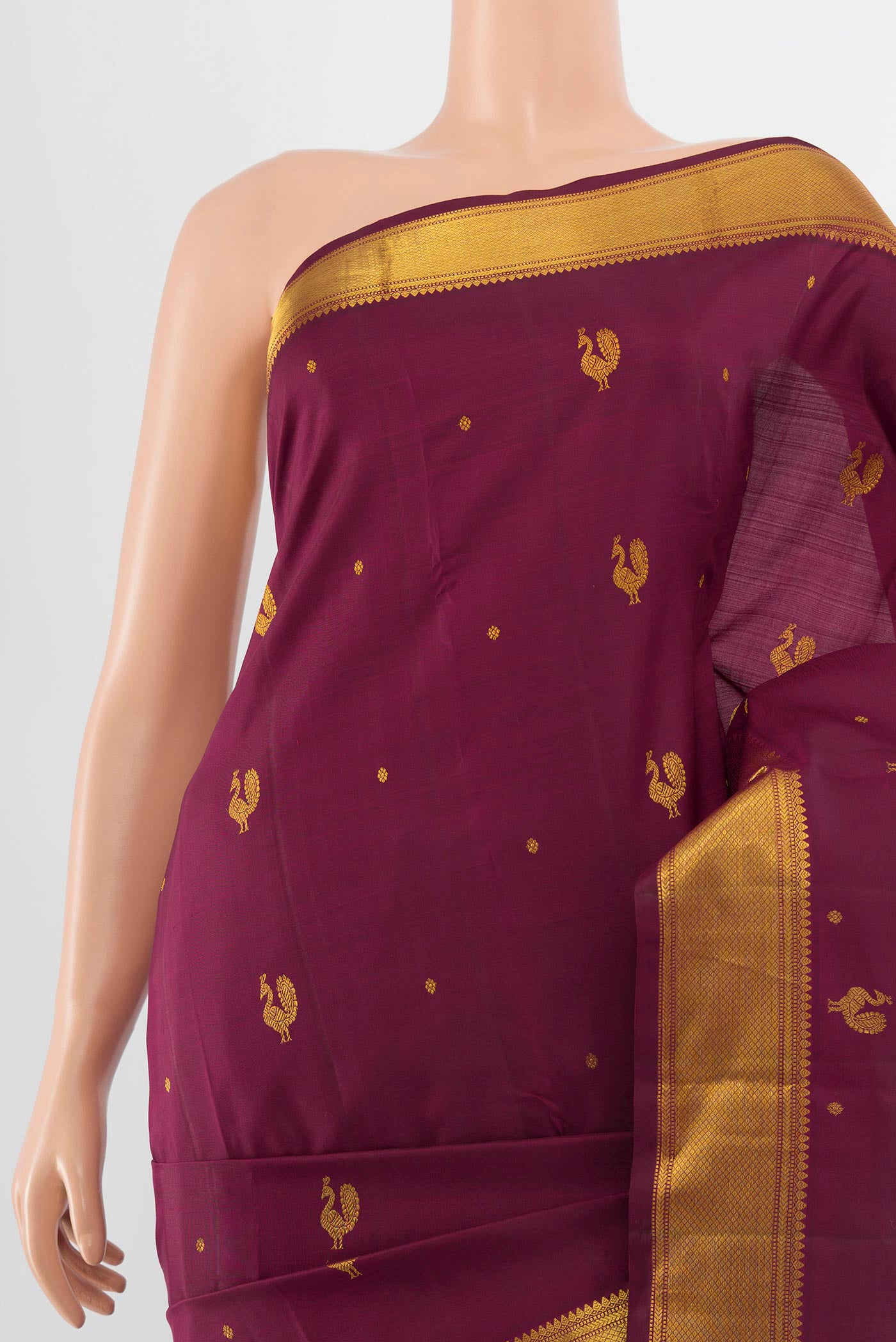 Border image of Pure Silk Pure Zari Maroon Kanchipuram Saree with Zari Butta on the body and Silk Border. 