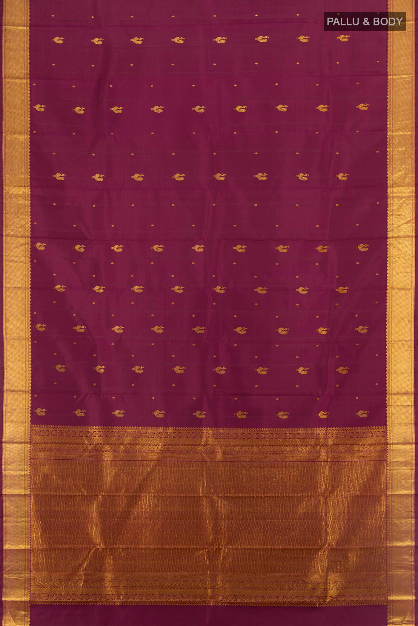 Flat view of Pure Silk Pure Zari Maroon Kanchipuram Saree with Zari Butta on the body and Silk Border. 