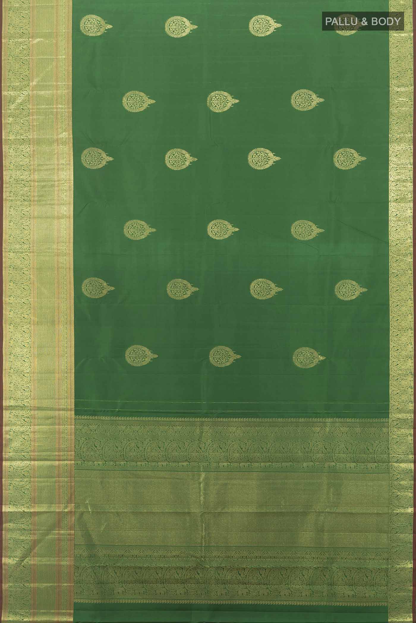 Flat view of Bottle Green Kanjivaram Silk Saree with Zari Butta on the body and Silk Border. 
