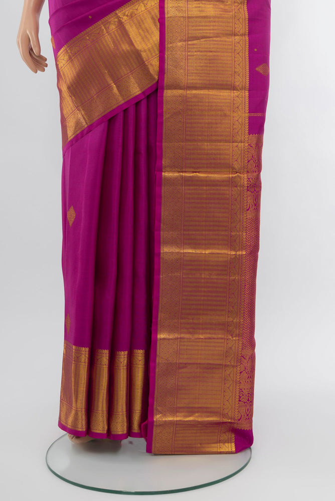 Pleats and pallu of Purple Kanjivaram Silk Saree with Zari Brocade on the body and Zari Border. 