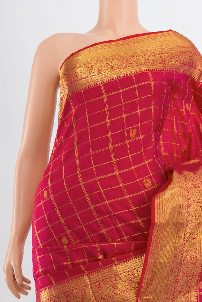 Border image of Dark Pink Kanjivaram Silk Saree with Zari Butta on the body and Silk Border. 