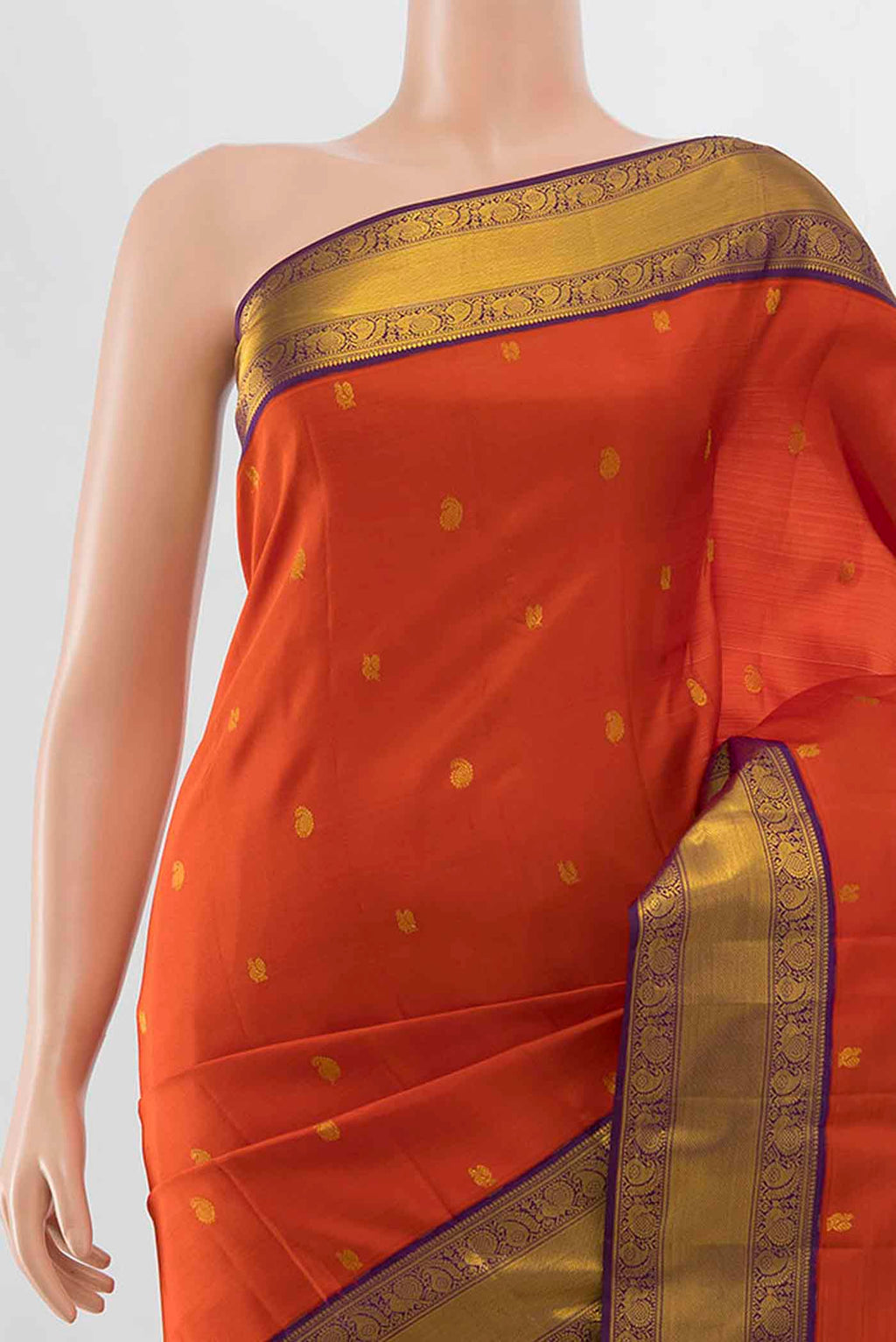 Border image of Orange Kanchipuram Silk Saree with Zari Butta on the body and Zari Border