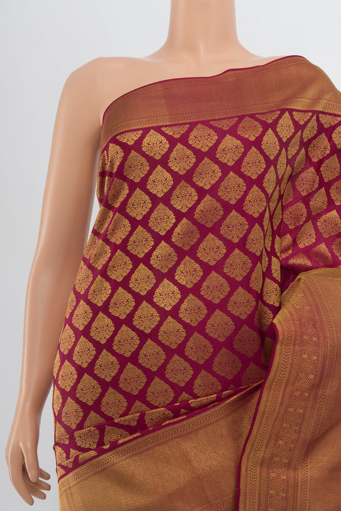 Border image of Dark Pink Kanjivaram Silk Saree with Zari Brocade on the body and Zari Border. 