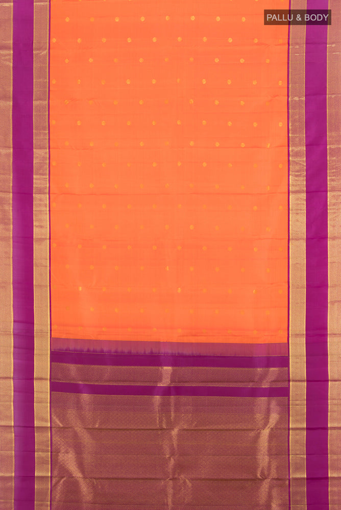 Flat view of Pure Silk Pure Zari Peach Kanjivaram Saree with Zari Butta on the body and Silk Border. 