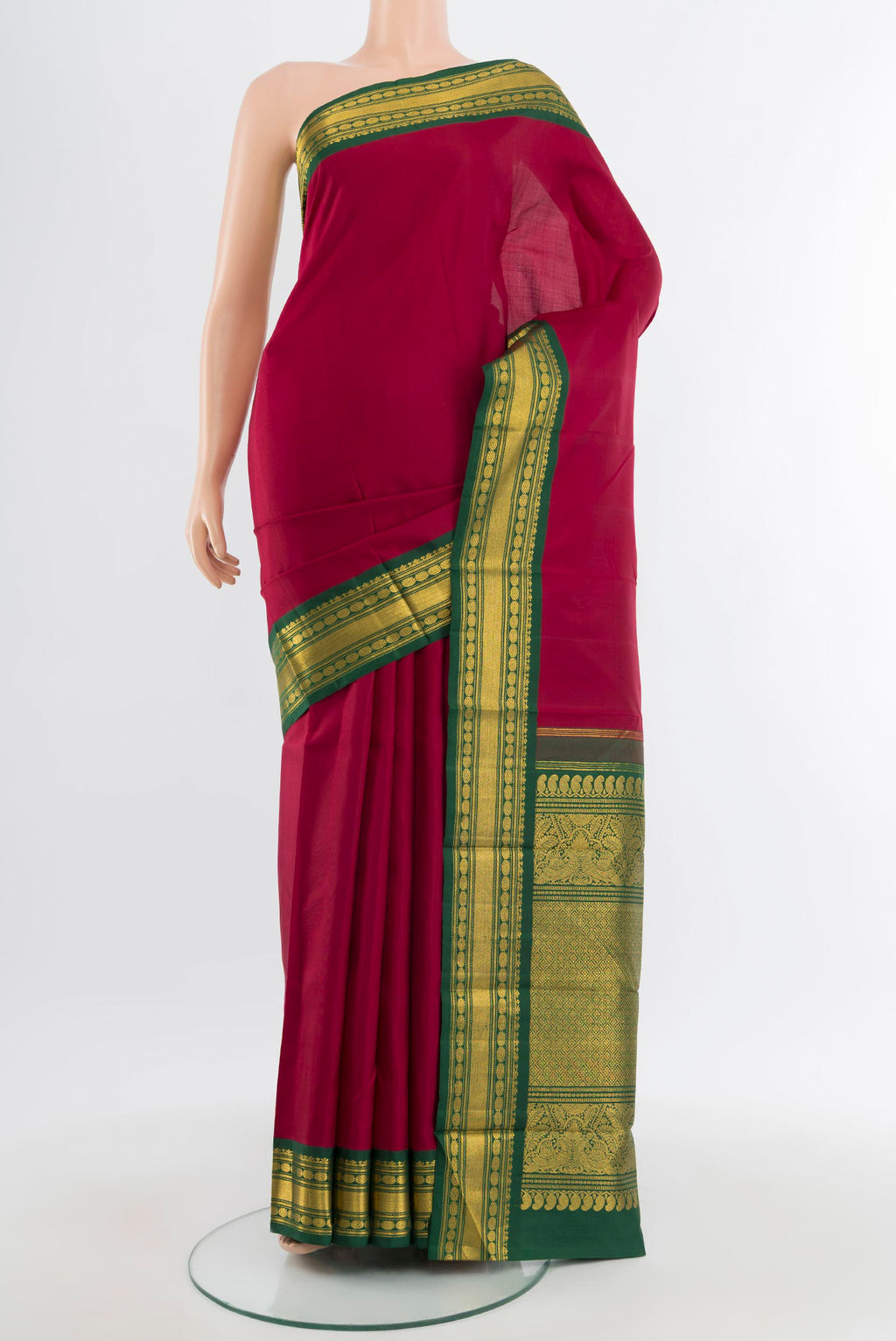 Pure Silk Pure Zari Maroon Kanchipuram Saree with Plain Body and Zari Border.  displayed on a mannequin