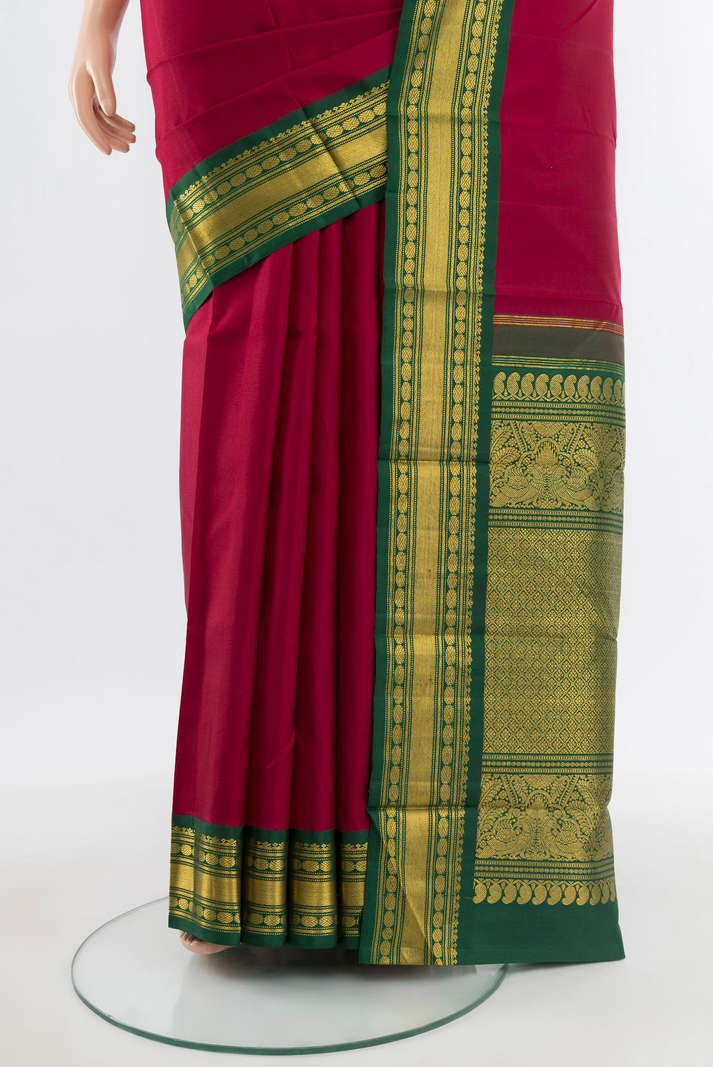 Pleats and pallu of Pure Silk Pure Zari Maroon Kanchipuram Saree with Plain Body and Zari Border. 