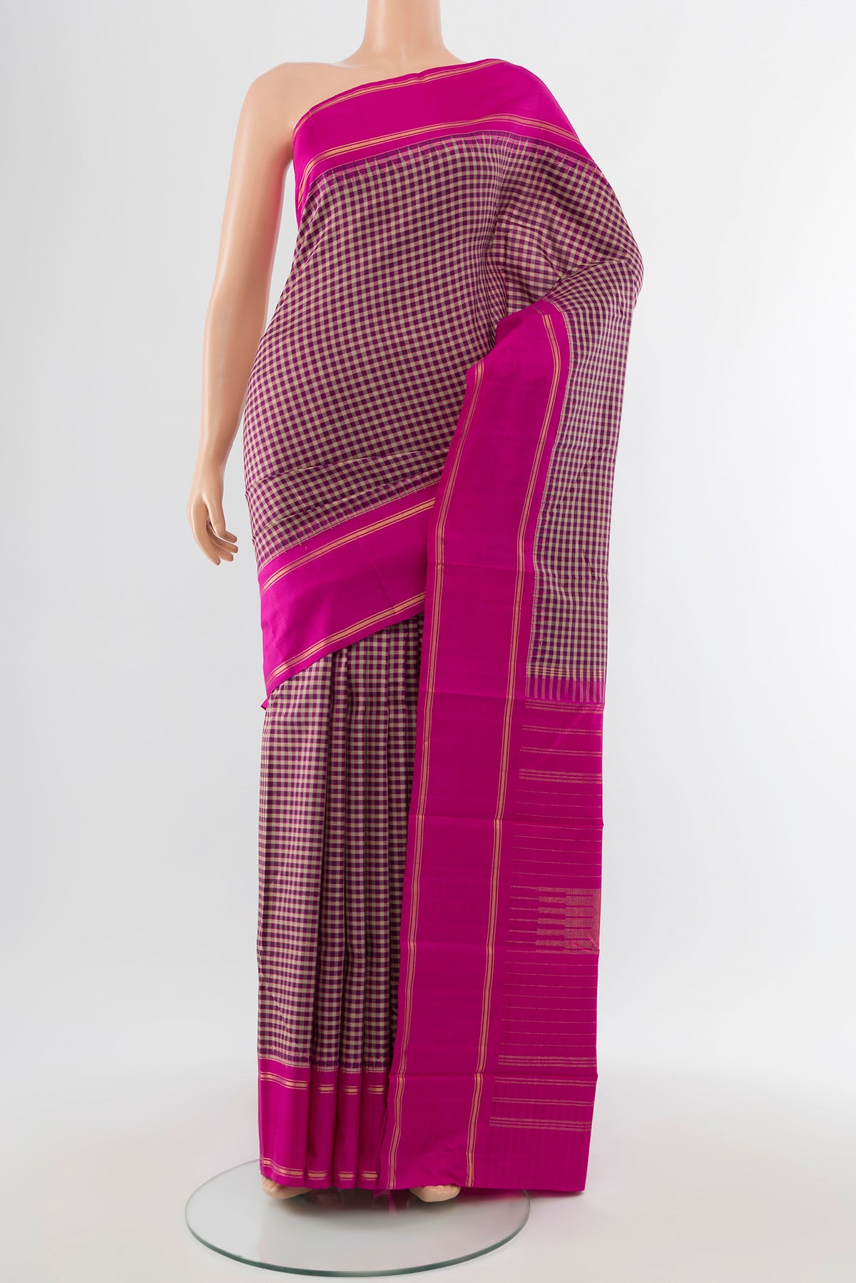 Pure Silk Pure Zari Multi Color Kanjivaram Saree with Checked design on the body and Silk Border.  displayed on a mannequin