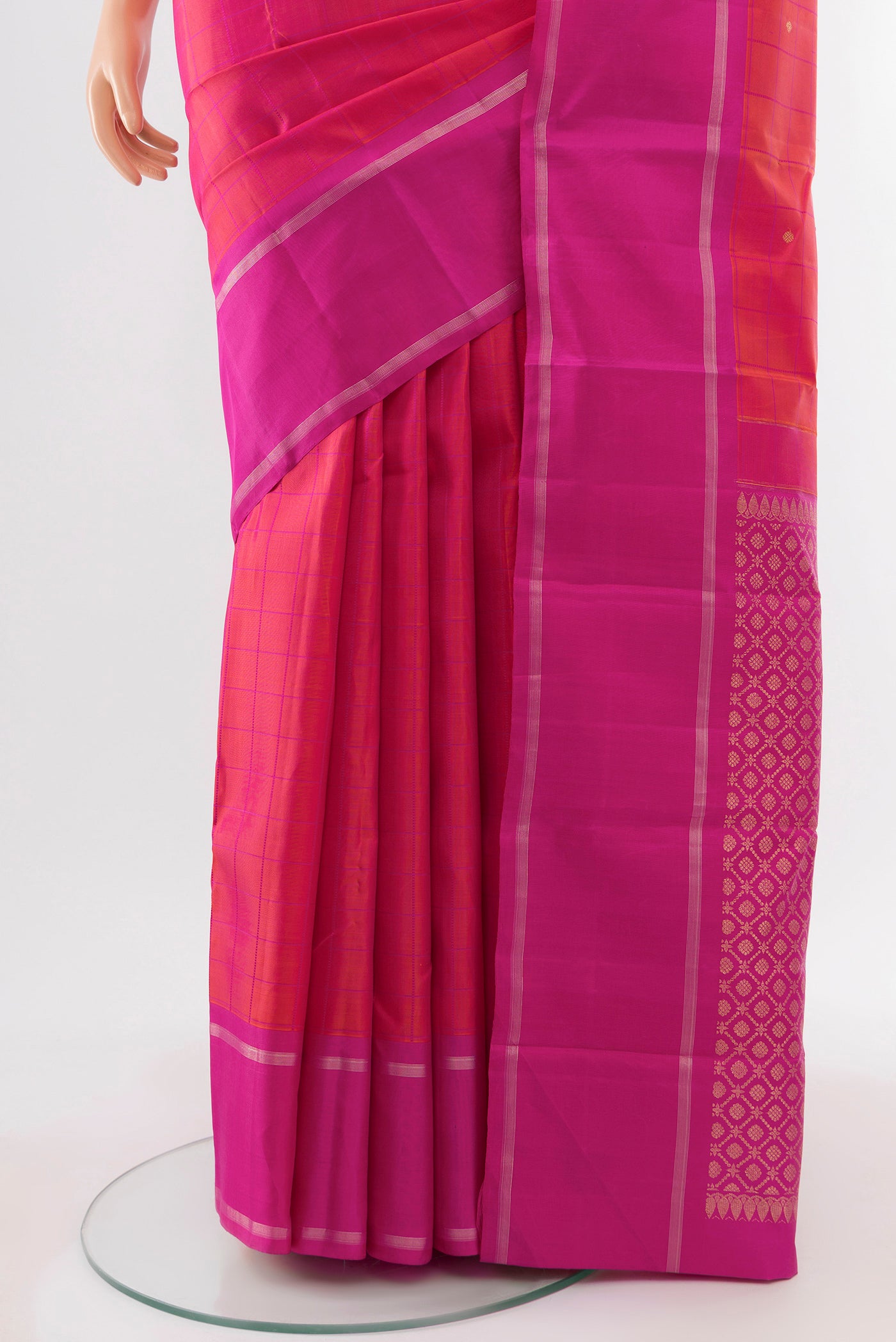Pleats and pallu of Pure Silk Pure Zari Peach Kanchipuram Saree with Zari Butta on the body and Silk Border. 