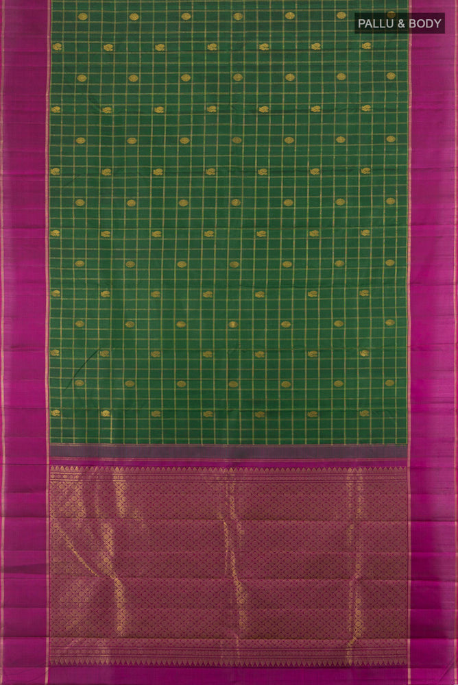 Flat view of Bottle Green Kanchipuram Silk Saree with Zari Butta on the body and Silk Border. 