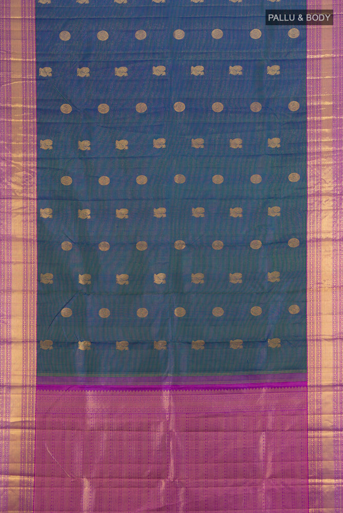 Flat view of Navy Blue Kanjivaram Silk Saree with Zari Butta on the body and Silk Border. 