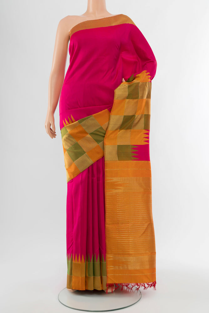 Multi Color Kanjivaram Silk Saree with Zari Butta on the body and Silk Border.  displayed on a mannequin
