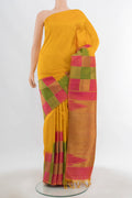 Multi Color Kanjivaram Silk Saree with Zari Butta on the body and Silk Border.  displayed on a mannequin