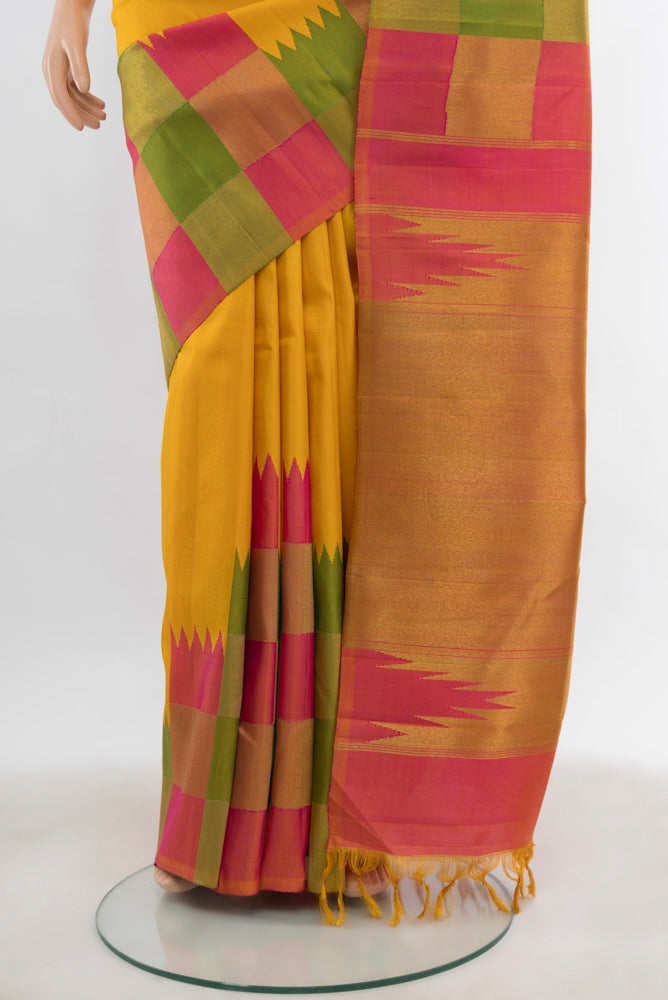 Pleats and pallu of Multi Color Kanjivaram Silk Saree with Zari Butta on the body and Silk Border. 