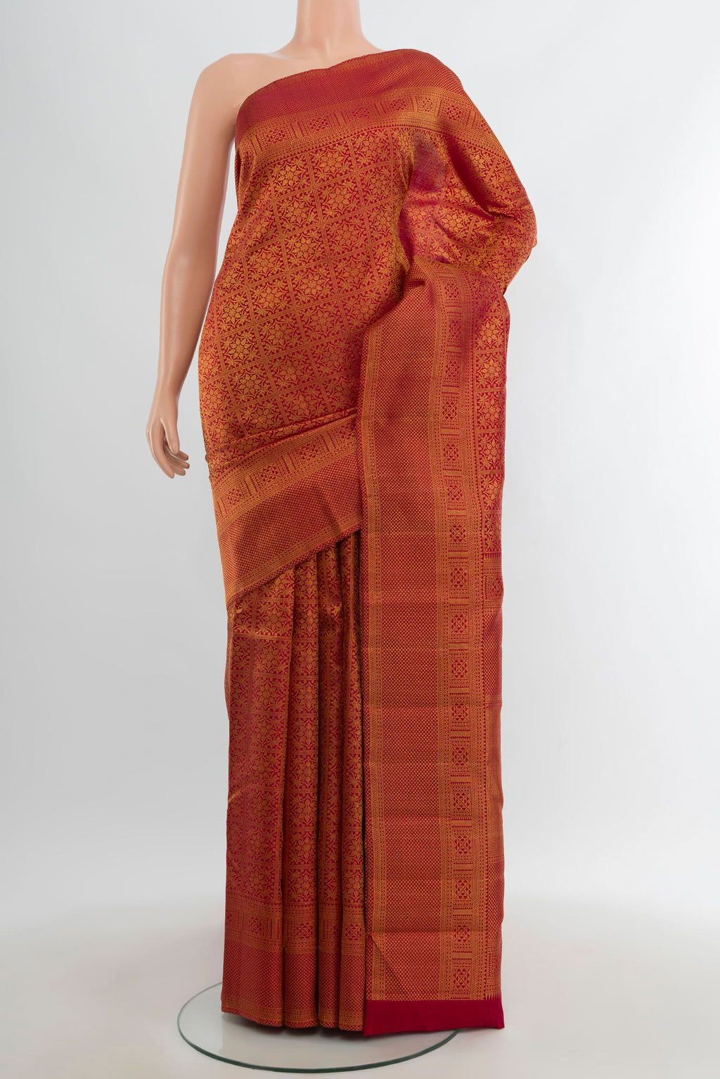 Maroon Kanchipuram Silk Saree with Zari Brocade on the body and Zari Border.  displayed on a mannequin