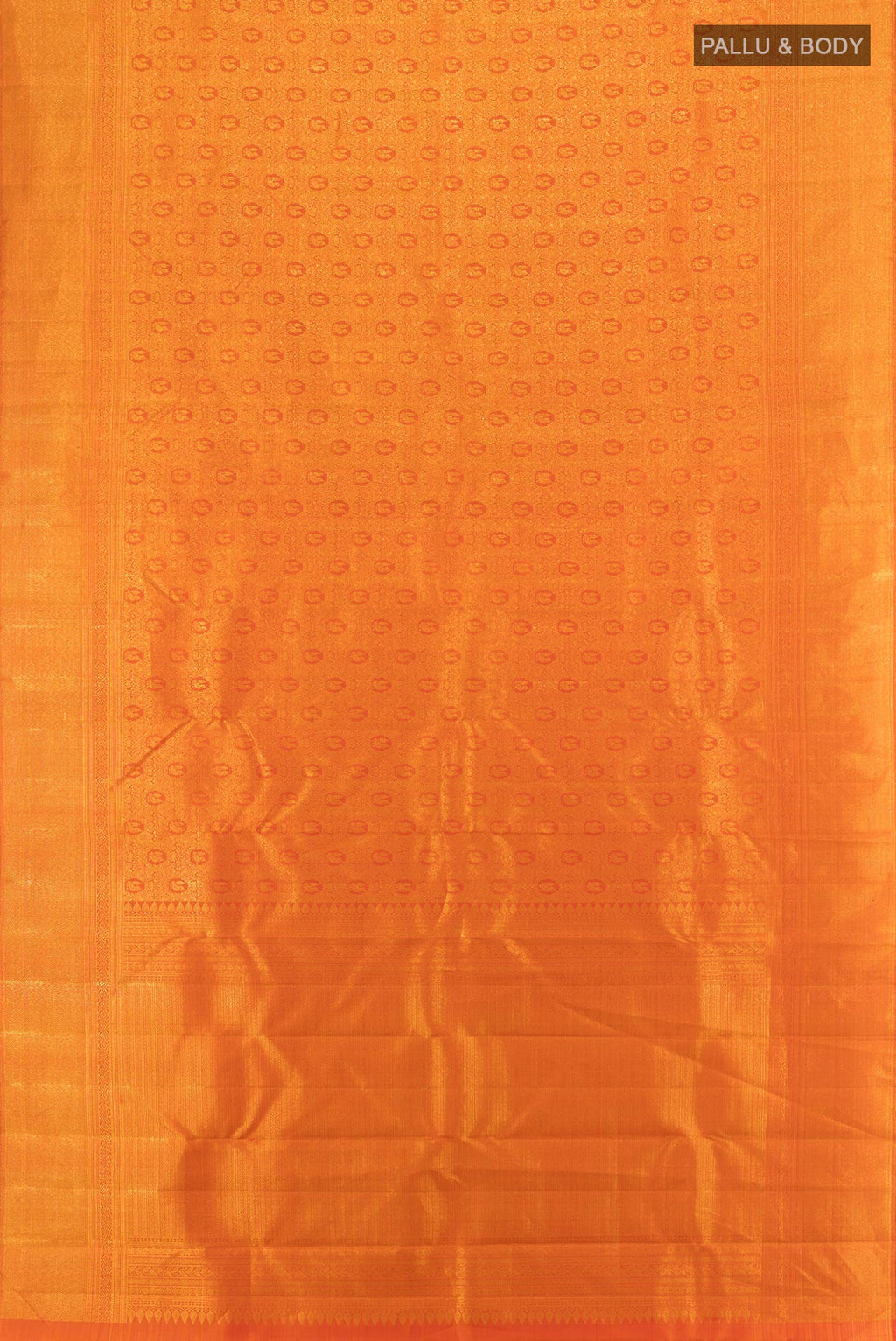 Flat view of Brick Orange Kanchipuram Silk Saree with Zari Brocade on the body and Zari Border. 