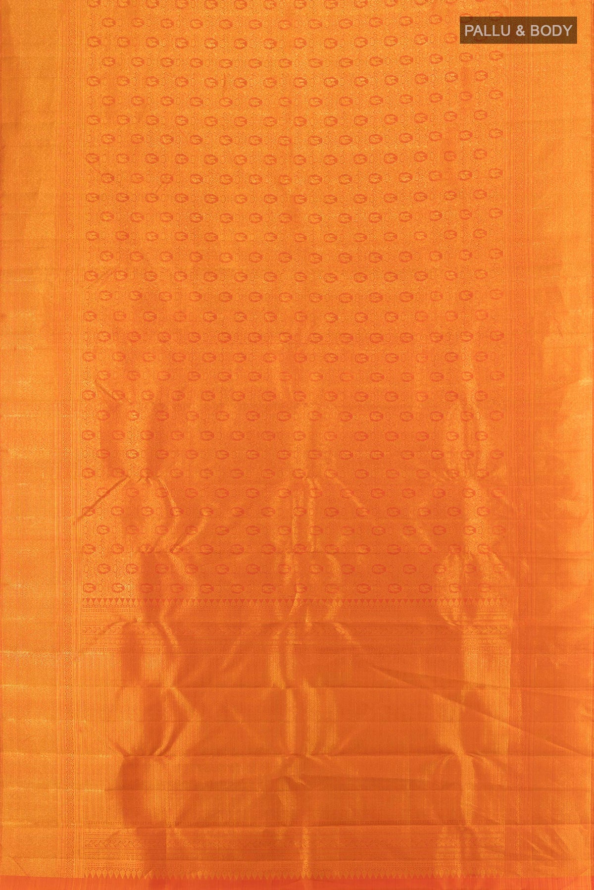 Flat view of Brick Orange Kanchipuram Silk Saree with Zari Brocade on the body and Zari Border. 