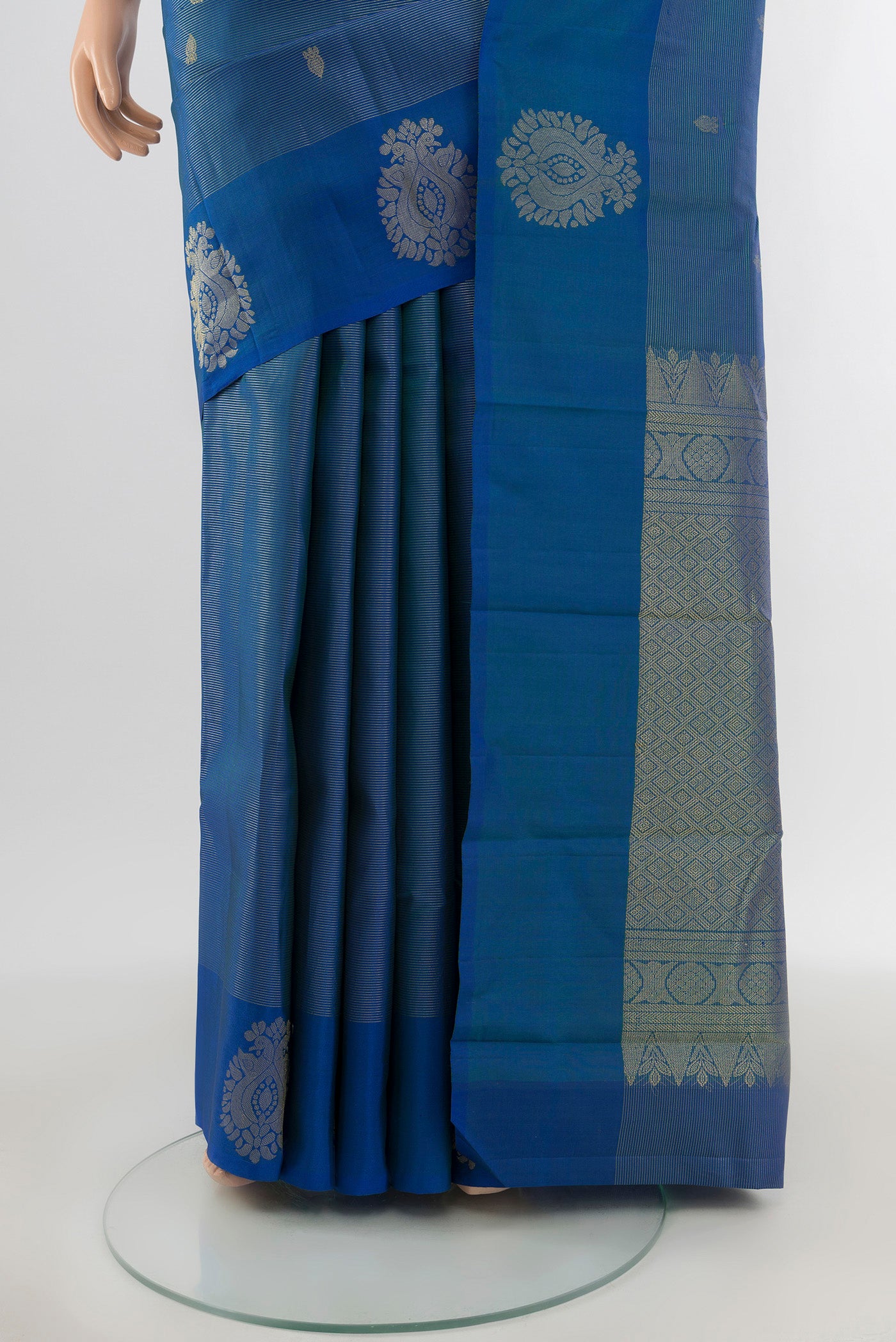 Pleats and pallu of Blue Kanchipuram Silk Saree with Zari Butta on the body and Zari Border. 