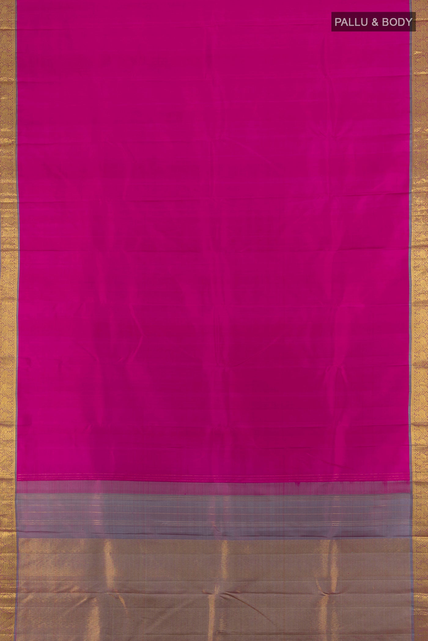 Flat view of Rani Pink Kanchipuram Silk Saree with Zari Butta on the body and Zari Border. 