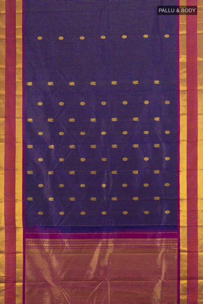 Flat view of Navy Blue Kanjivaram Silk Saree with Zari Butta on the body and Silk Border. 