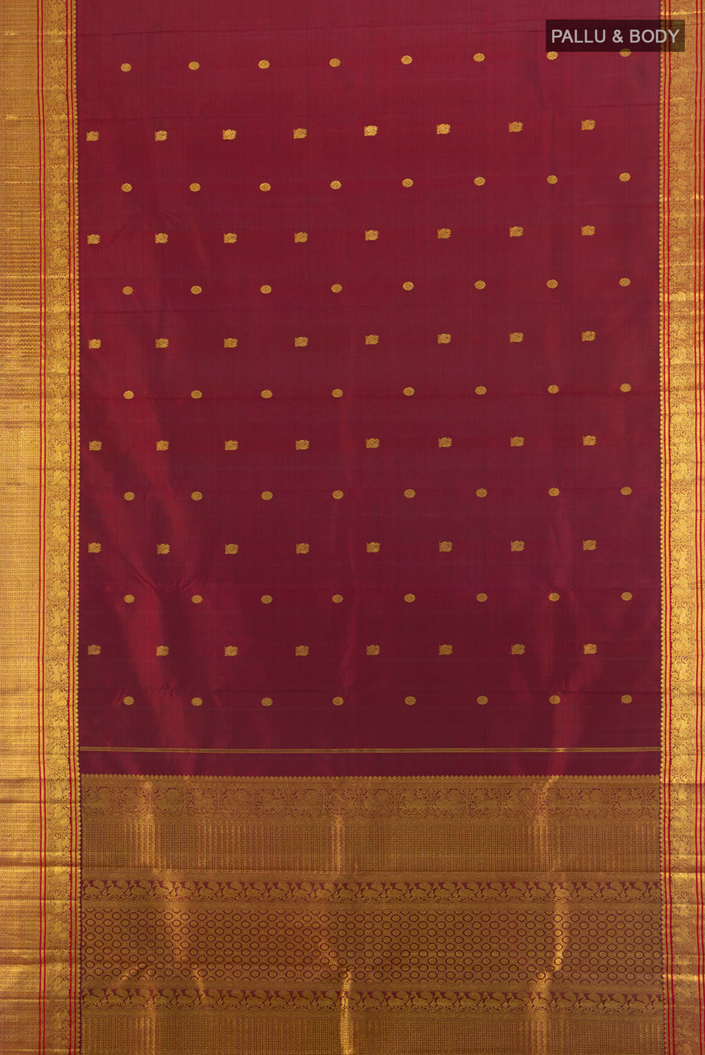 Flat view of Pure Silk Pure Zari Maroon Kanchipuram Saree with Zari Butta on the body and Zari Border. 