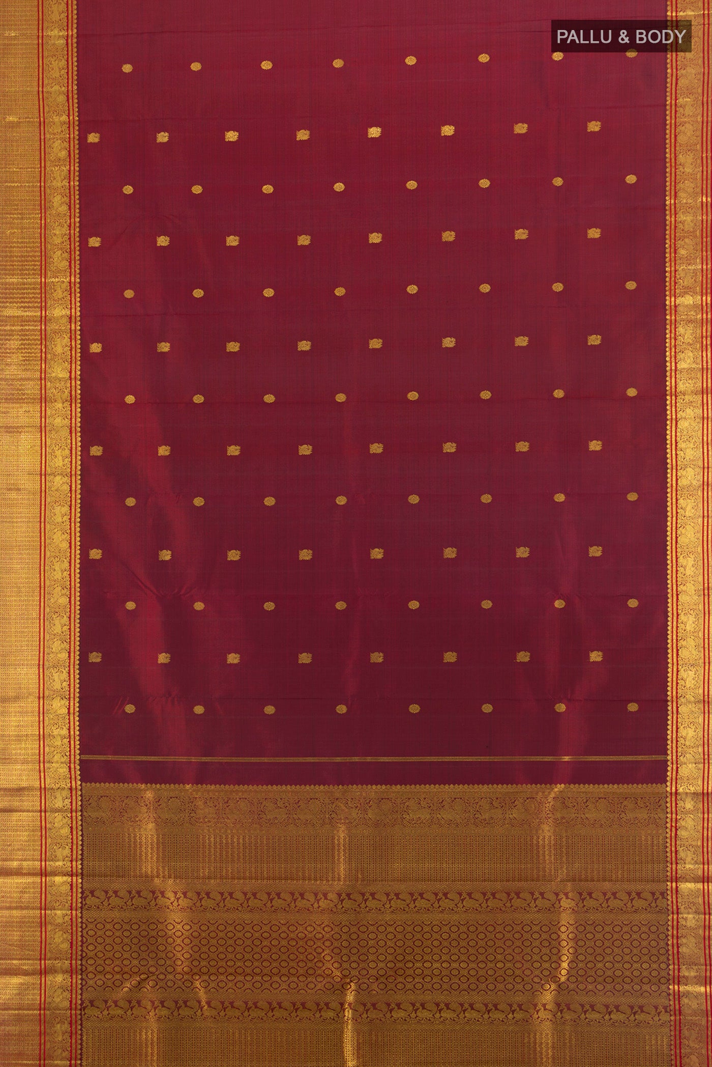 Flat view of Pure Silk Pure Zari Maroon Kanchipuram Saree with Zari Butta on the body and Zari Border. 