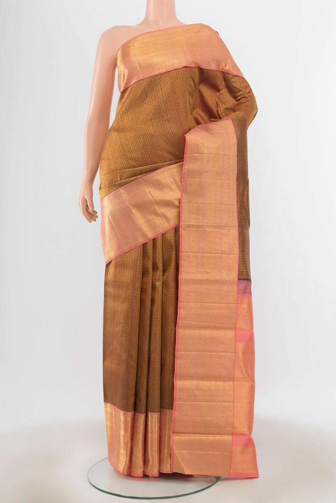 Maroon Kanchipuram Silk Saree with Zari Butta on the body and Silk Border.  displayed on a mannequin