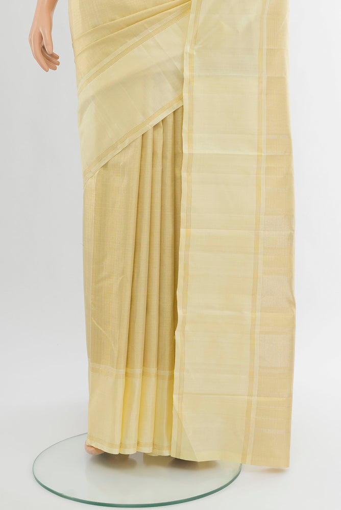 Pleats and pallu of Pure Silk Pure Zari Golden Kanjivaram Saree with Zari Butta on the body and Silk Border. 