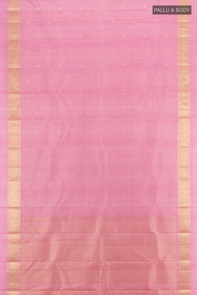 Flat view of Rose Gold Kanjivaram Silk Saree with Zari Butta on the body and Silk Border. 