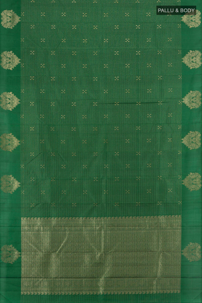 Flat view of Bottle Green Kanjivaram Silk Saree with Zari Butta on the body and Silk Border. 