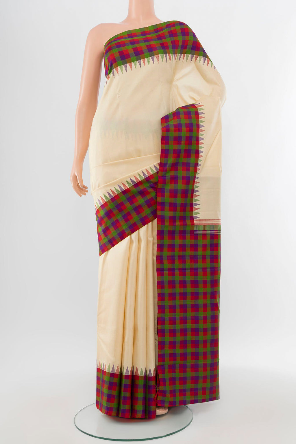 Pure Silk Pure Zari Cream Kanjivaram Saree with Zari Butta on the body and Silk Border.  displayed on a mannequin