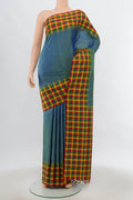 Light Blue Kanjivaram Silk Saree with Zari Butta on the body and Silk Border.  displayed on a mannequin