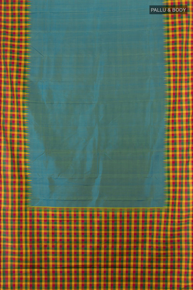 Flat view of Light Blue Kanjivaram Silk Saree with Zari Butta on the body and Silk Border. 
