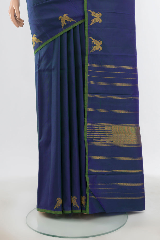 Pleats and pallu of Pure Silk Pure Zari Dark Blue Kanjivaram Saree with Zari Butta on the body and Silk Border. 
