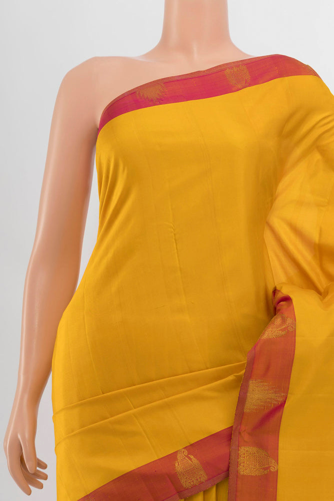 Border image of Mustard Kanjivaram Silk Saree with Zari Brocade on the body and Silk Border. 